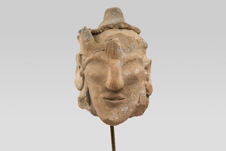 Голова юноши в головном уборе со сложным декором. Лимнити, 4-я четверть VI века до н.э.